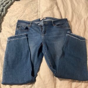 Loft Outlet modern skinny jeans with slight distressing and frayed hem